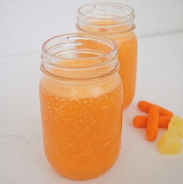 Carrot-Pineapple-Smoothie-in-2-glasses