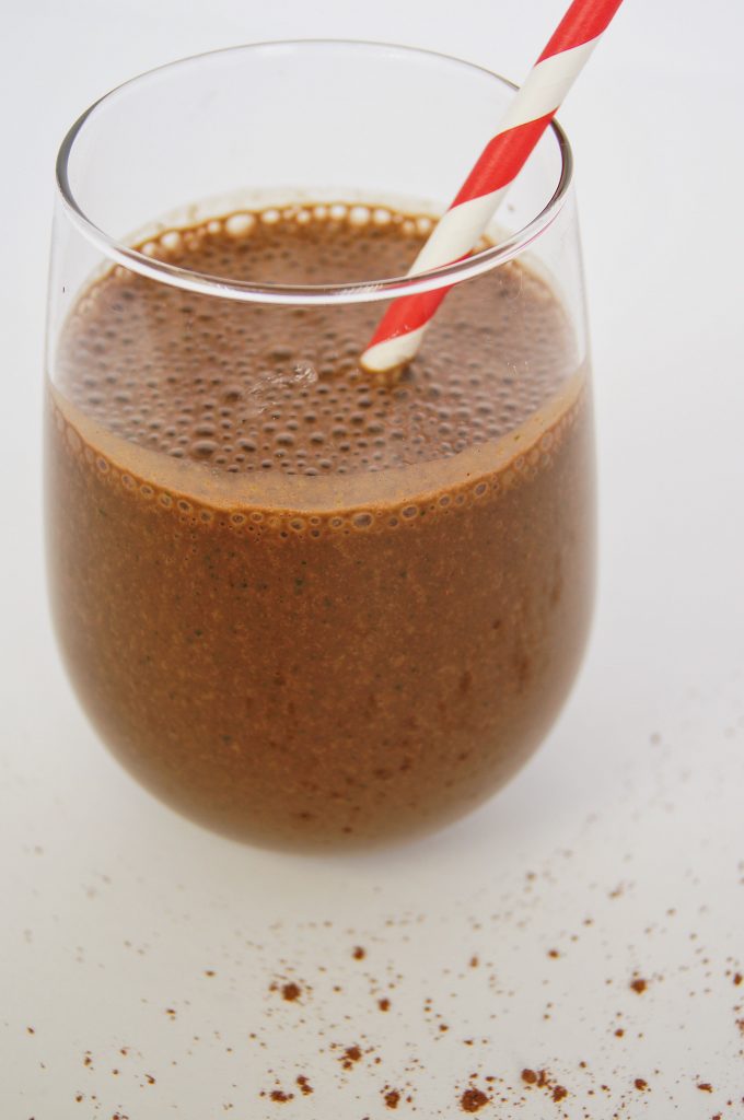 Dark-Chocolate-and-Banana-Smoothie-in-a-glass-with-red-striped-straw