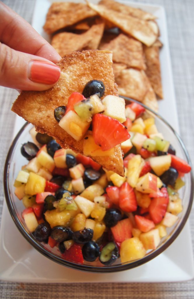 Fruit Salsa and Cinnamon Chips with hand holding chip and fruit